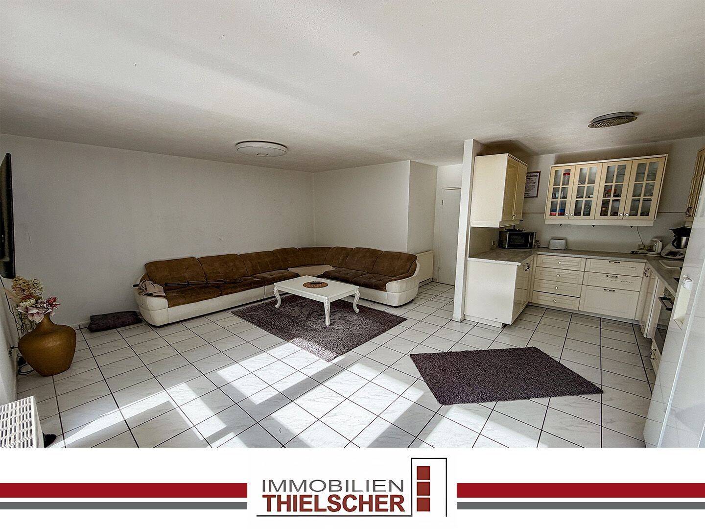 Wohnen mit Garten: 3-Zimmer-Erdgeschosswohnung mit Terrasse und Garage, 52531 Übach-Palenberg