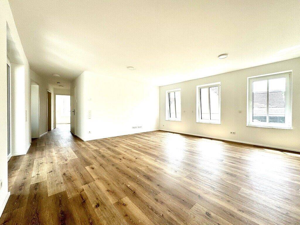 Neubau-Erstbezug A+ – 3 Zimmer mit Balkon und Garage nahe dem Zentrum, 55130 Mainz (Laubenheim Weisenau)