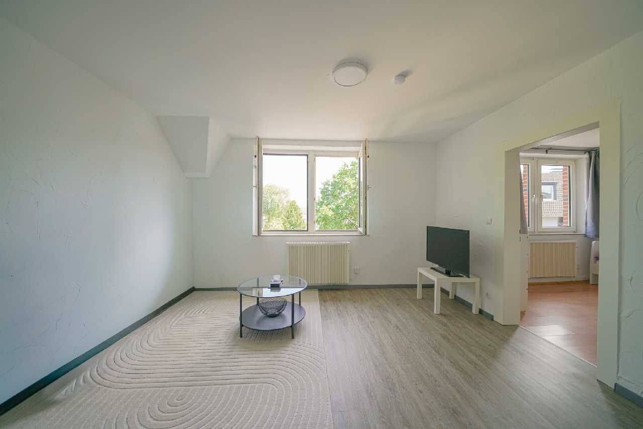 Ratingen-Ost: Helle 2-Zimmer-Wohnung mit Einbauküche und Gartenmitbenutzung, 40882 Ratingen