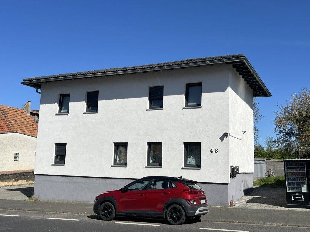 Attraktives Anlageobjekt: Modernisiertes Mehrfamilienhaus mit 3 Wohneinheiten in Langgöns, 35428 Langgöns