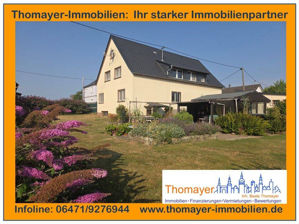 ***Gepflegtes Raumwunder in Ortsrandlage mit großem Garten und 2 Garagen!!!***, 65614 Beselich