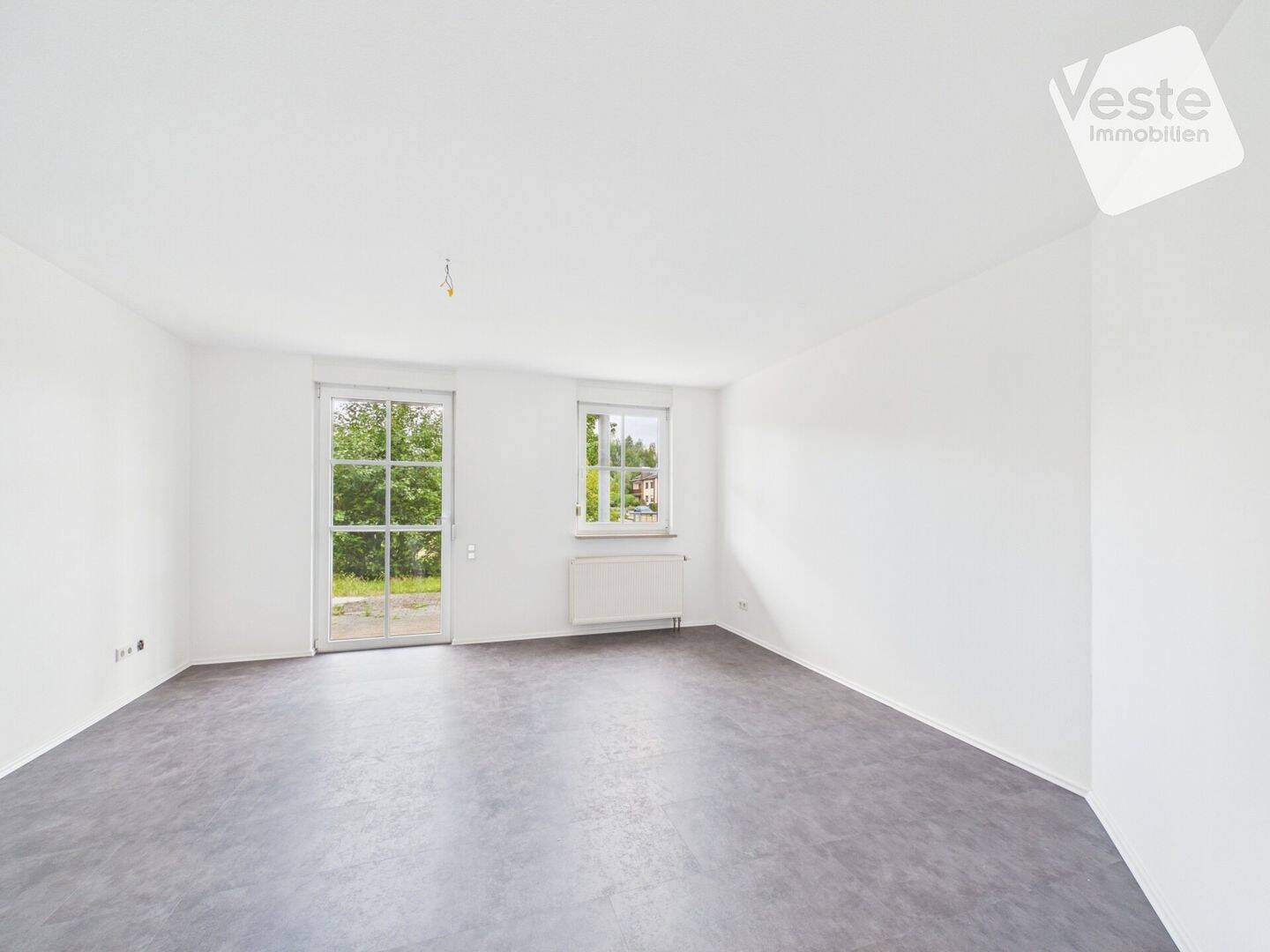 Schöne Erdgeschosswohnung mit Terrasse und TG-Stellplatz in Sonnefeld, 96242 Sonnefeld
