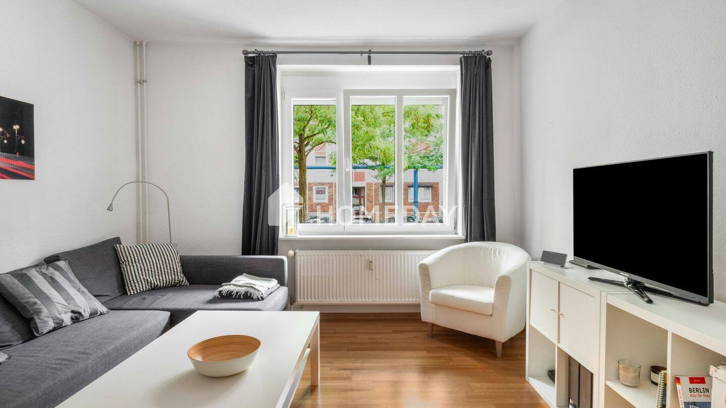 Ihr neues Wohnglück: Stilvolle Hochparterrewohnung mit Parkett und Einbauküche