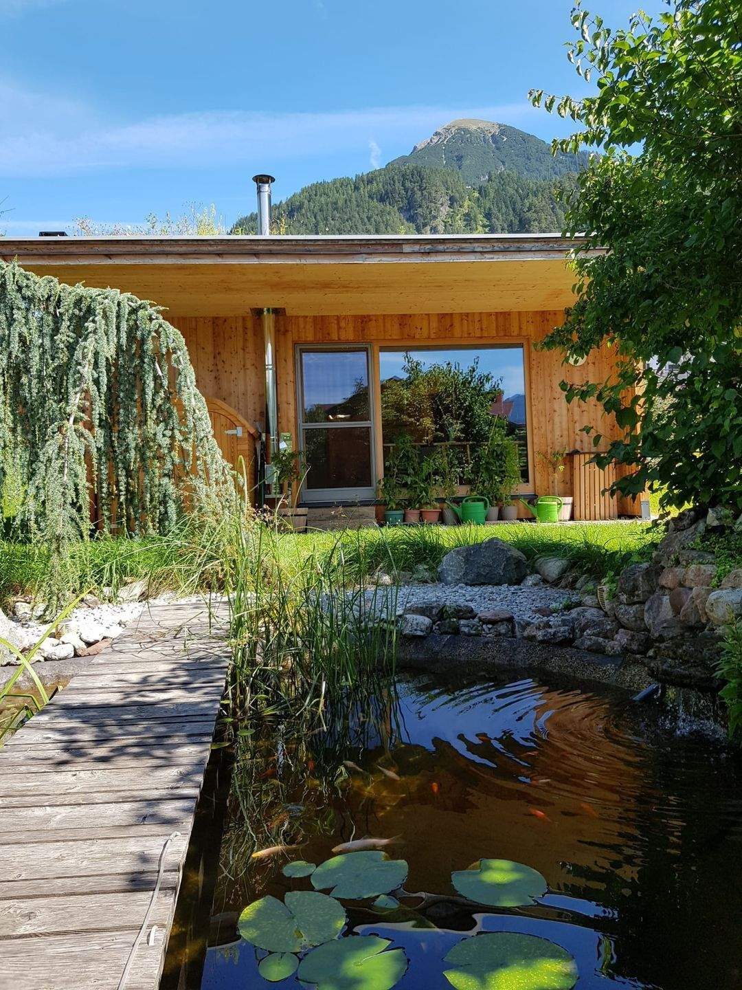 „Alpines Lebensgefühl trifft Naturverbundenheit“  Zwei charmante Holzhäuser in Elmen (Reutte-Tirol) bieten einzigartigen Rückzugsort zum Wohnen, 87459 Pfronten