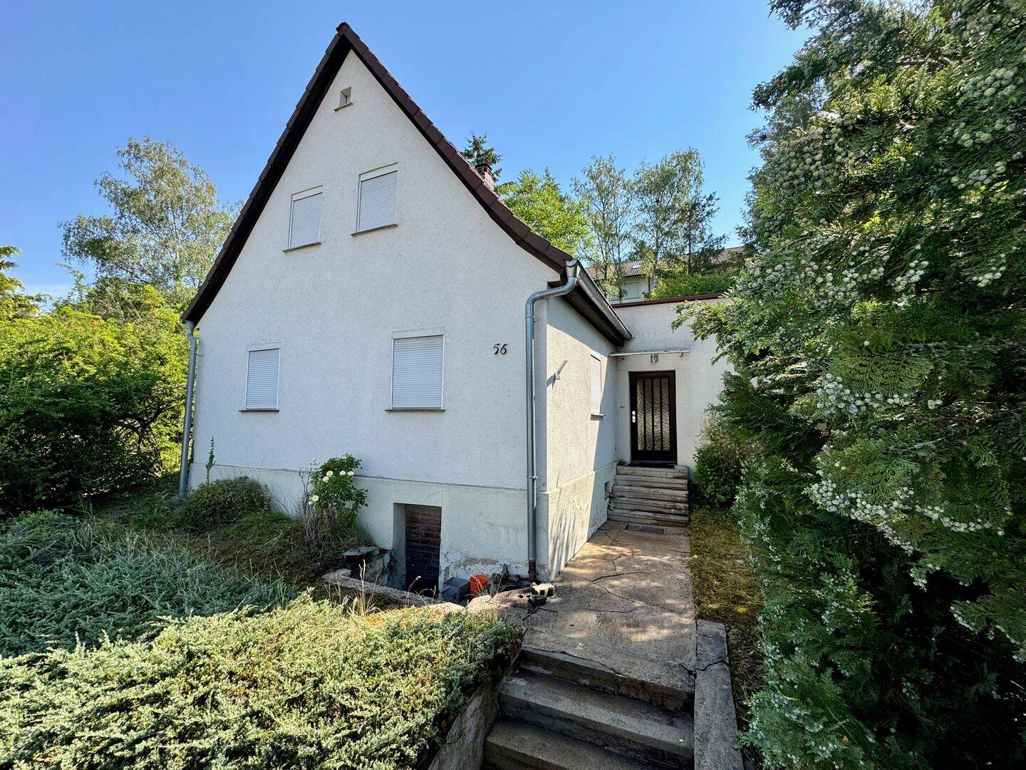 Charmantes Einfamilienhaus mit großem Grundstück und außergewöhnlichem Entwicklungspotenzial in Dittelbrunn, 97456 Dittelbrunn