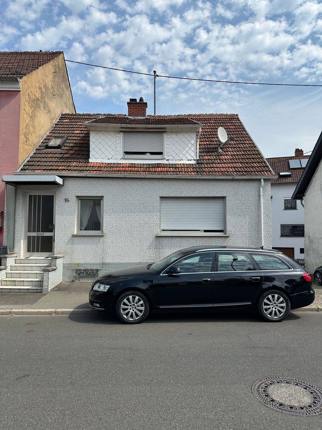 Wannemacher Immobilien **** Gemütliches Einfamilienhaus mit Garage in einer zentralen Lage von Wiebelskirchen ****, 66540 Neunkirchen