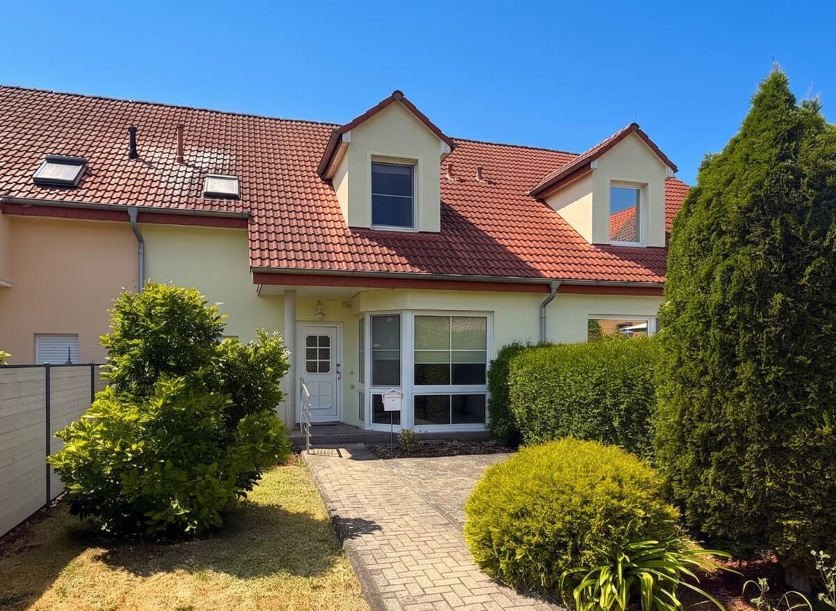 Leben in Zscherndorf – familienfreundliches Reihenmittelhaus mit Terrasse, Garten und Garage, 6792 Sandersdorf-Brehna