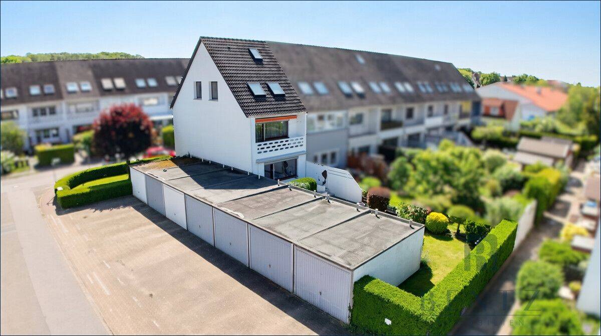 Langen: Gepflegtes Reihenendhaus auf West-Grundstück mit Garage, 27607 Geestland