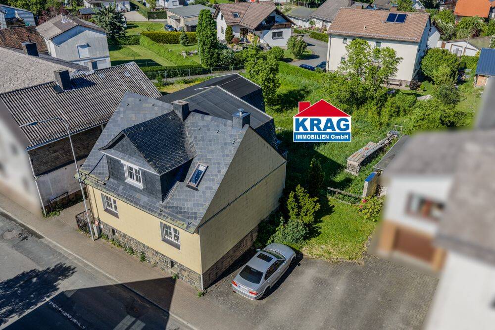 ++ KRAG Immobilien ++ Wohnhaus mit Garten, Garage und Eigenleister-Potenzial, 35080 Bad Endbach
