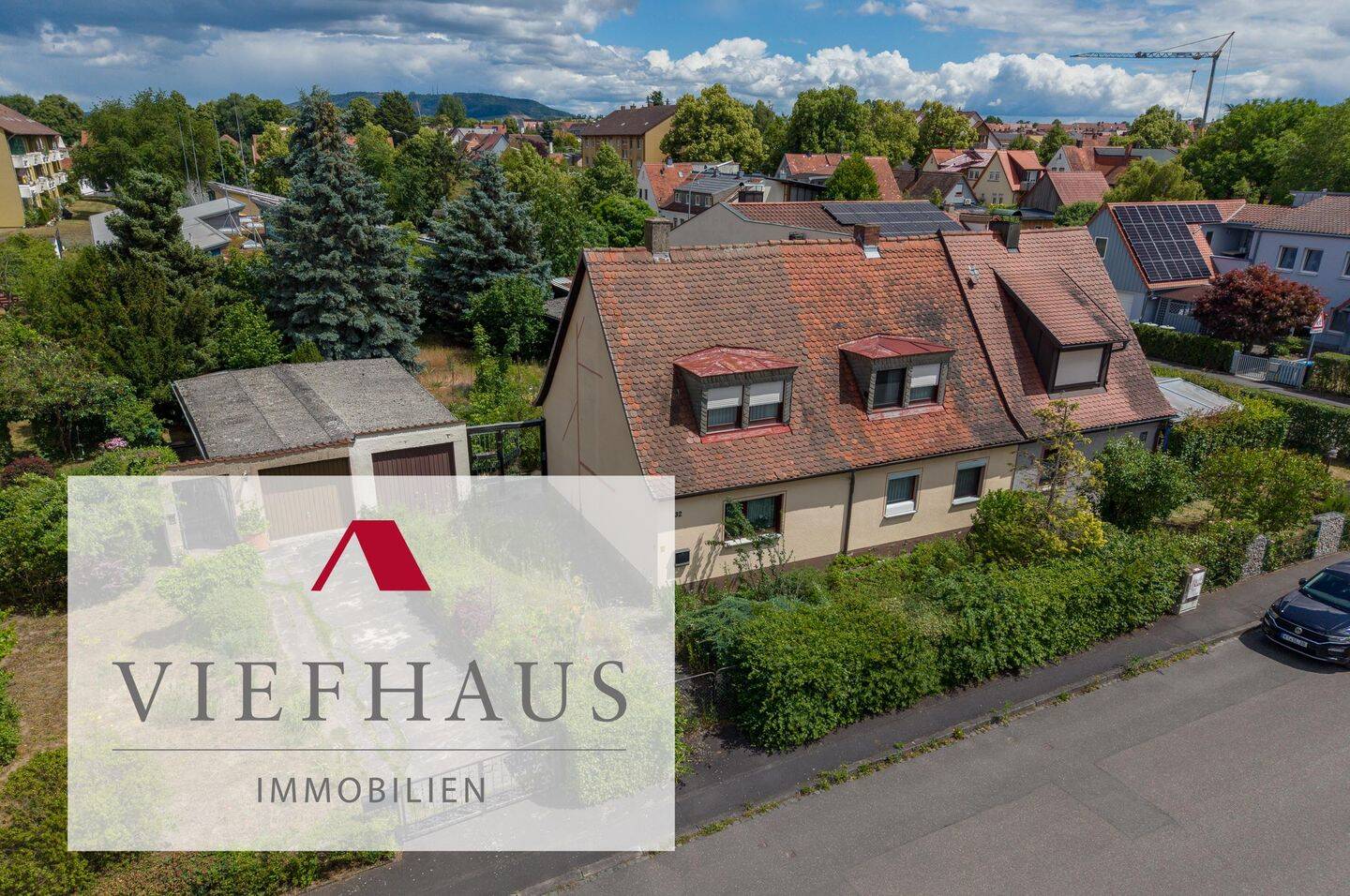 Ihr neues Zuhause mit großem Garten – Einfamilienhaus mit Garage und Nebengebäuden auf 632 m² Grundstück, 97318 Kitzingen
