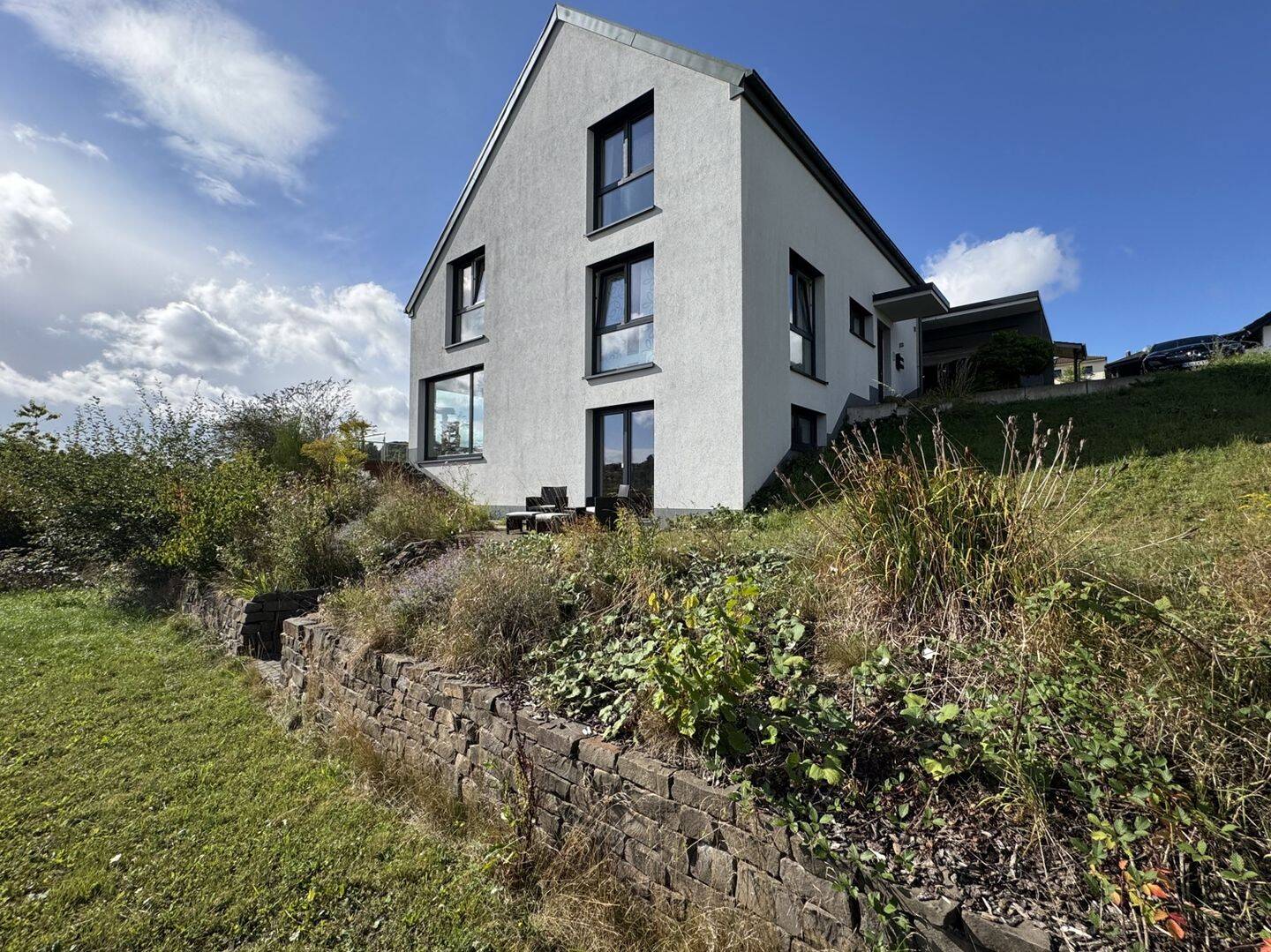 IK | Altenkirchen: Modernes Split-Level-Einfamilienhaus am Feldrand von Altenkirchen, 66903 Altenkirchen