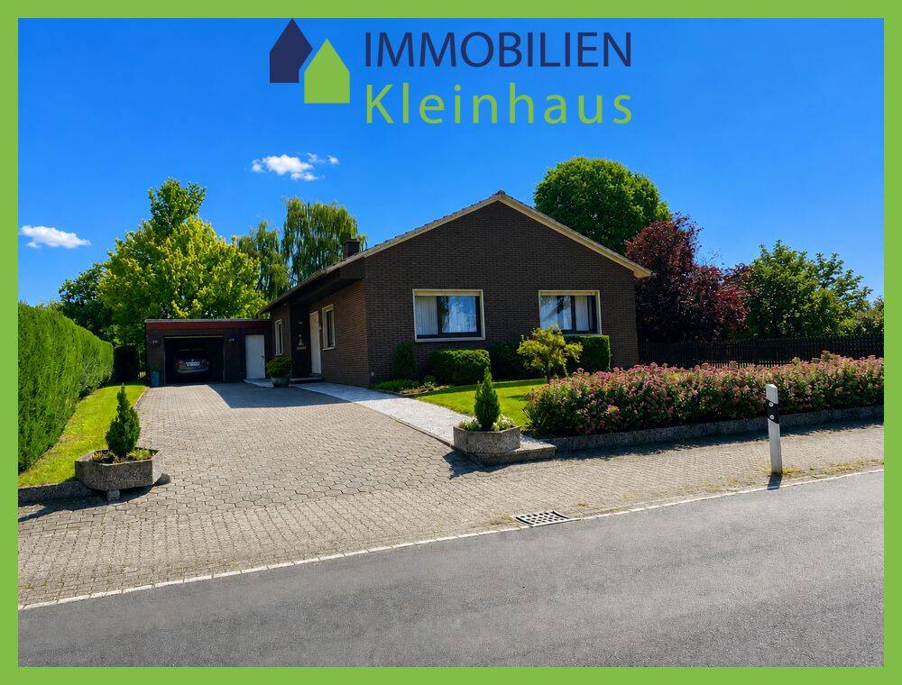 Gepflegtes ebenerdiges Wohnhaus mit Einliegerwohnung in idyllischer Kanallage von Papenburg – Ortsteil Obenende, 26871 Papenburg