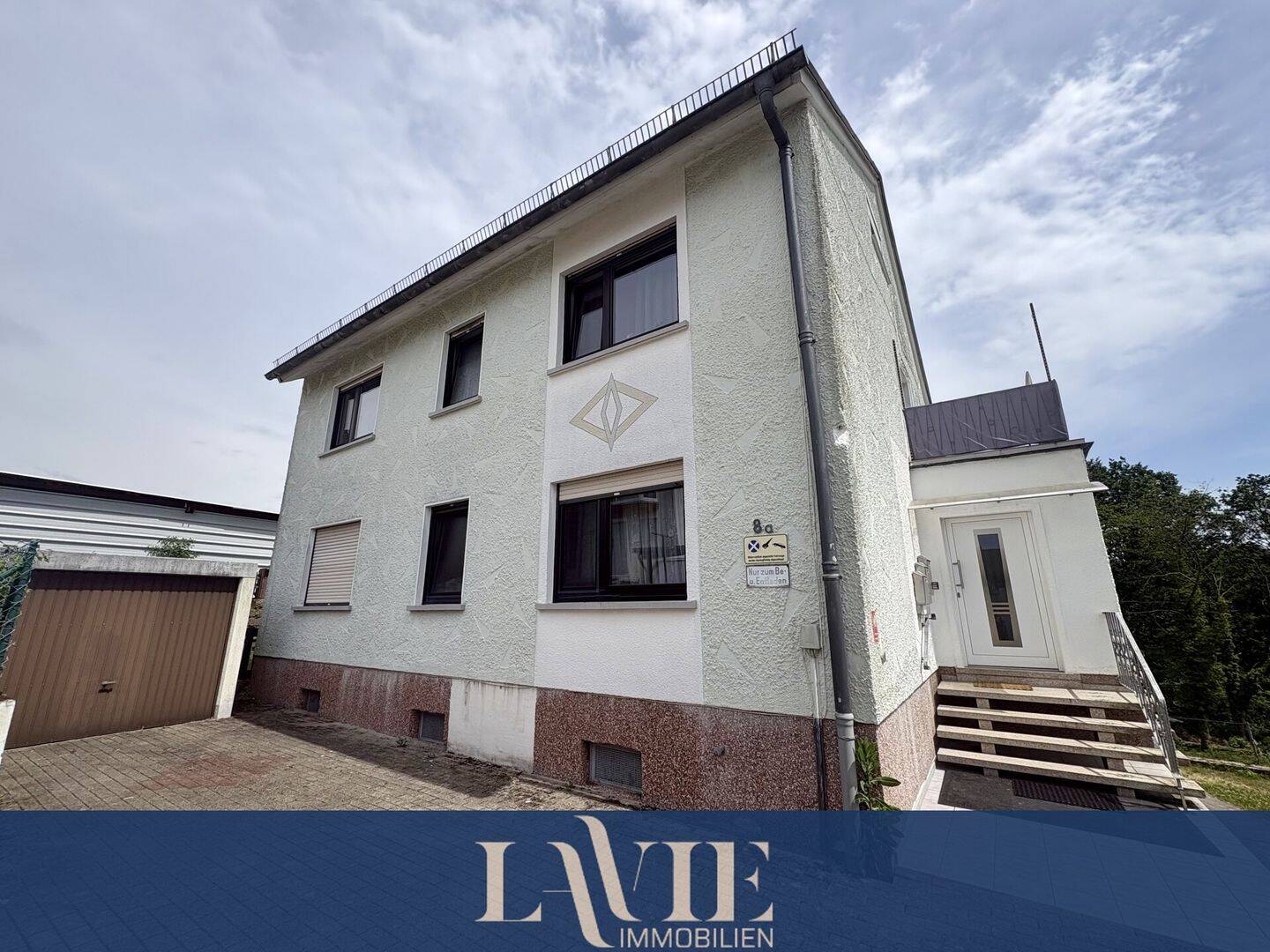Attraktives Anlageobjekt: Gepflegtes Dreifamilienhaus mit Garagen und 957 m² Grundstück, 66450 Bexbach