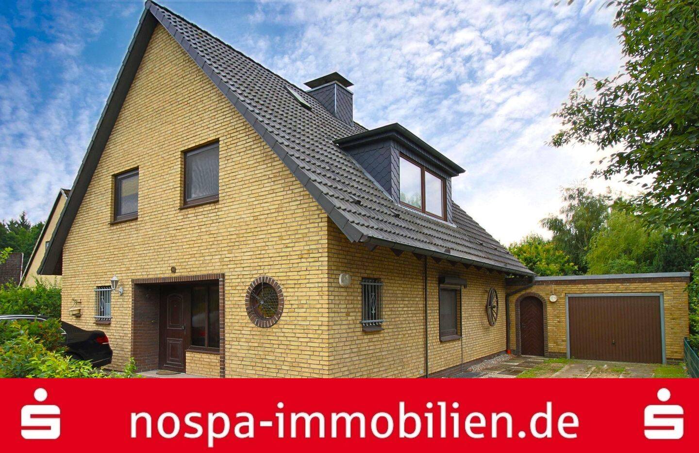 Einfamilienhaus mit Garage, 3 Pkw-Stellplätzen und Terrasse in Kropp, 24848 Kropp