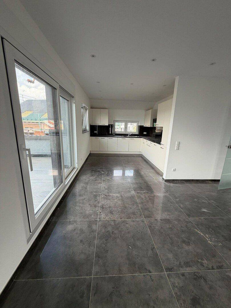 Moderne 4-Zimmer-Neubauwohnung mit Einbauküche, Balkon und Stellplatz in Rodenbach, 63517 Rodenbach