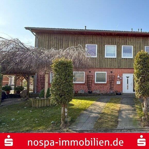 Großzügiges Wohnen mit Potenzial! Reihenendhaus mit Doppelcarport und Garage in Hüllerup, 24983 Handewitt