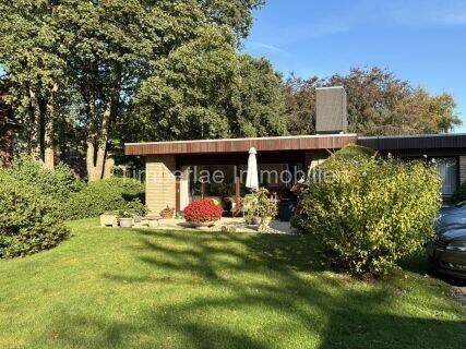 Charmanter Flachdachbungalow mit 2 Ferienwohnungen – Traumhafte Gartenanlage nahe dem Timmeler Meer, 26629 Großefehn