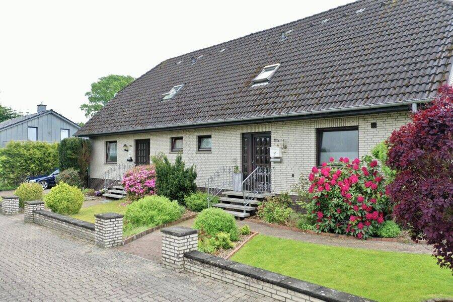 Charmantes Doppelhaus mit zwei vermieteten Wohneinheiten, 27419 Sittensen