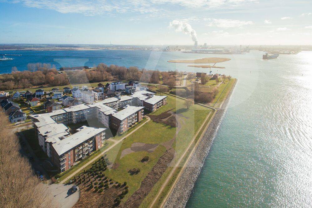 Wohnen mit Wasserblick – 2-Raum-Wohnung am Seekanal mit Balkon und TG-Stellplatz, 18119 Rostock (Diedrichshagen Hohe Düne Seebad Warnemünde)