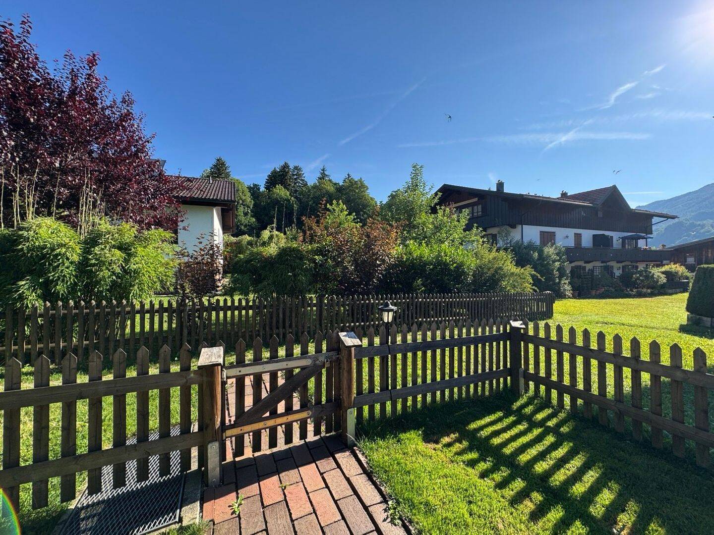 Vermietete, ruhige 3-Zi.-Garten-ETW mit Ostterrasse, Kellerraum und Tiefgaragenplatz, 83259 Schleching