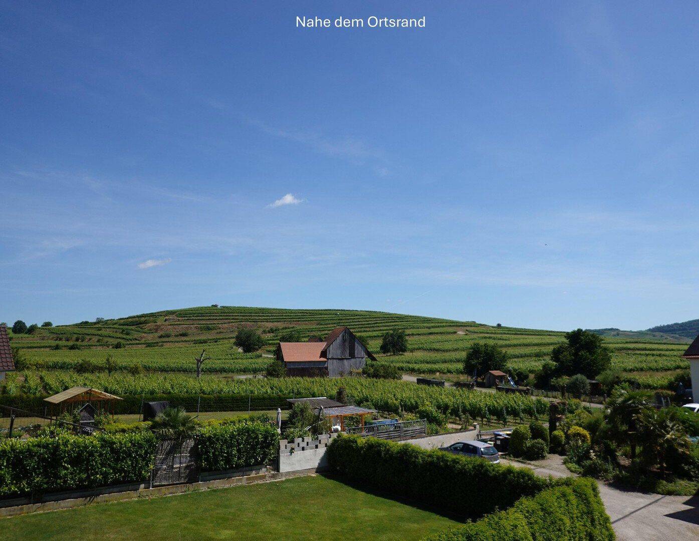 Wohnen mit Wohlfühlfaktor: 4,5 Zimmer Maisonette mit Terrasse, Balkon & Weinbergblick, 79235 Vogtsburg im Kaiserstuhl