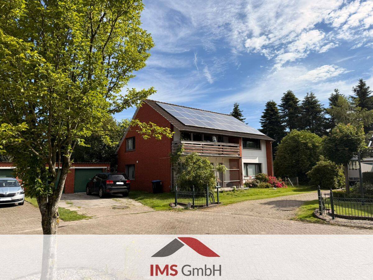 Provisionsfrei! Vermietetes Zweifamilienhaus mit Doppelgarage und PV-Anlage in Moormerland zu verkaufen, 26802 Moormerland