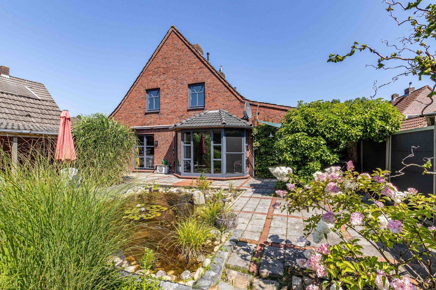 Charmante Doppelhaushälfte mit liebevoll angelegtem Garten in Wittmund, 26409 Wittmund