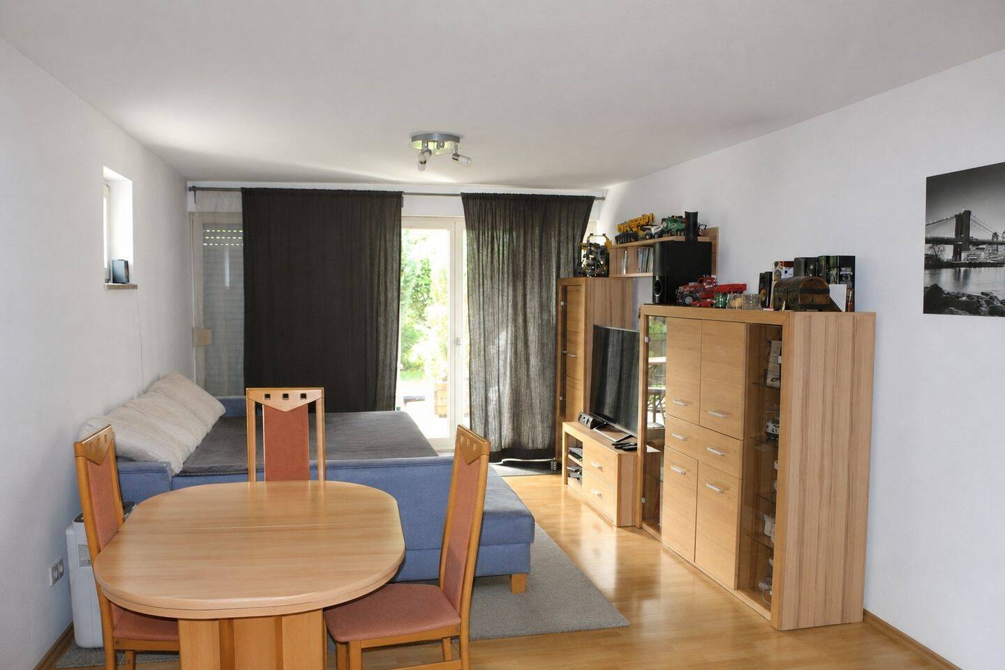 Gepflegte 2-Zimmer-Erdgeschosswohnung mit Terrasse und Gartenanteil in Puchheim, 82178 Puchheim