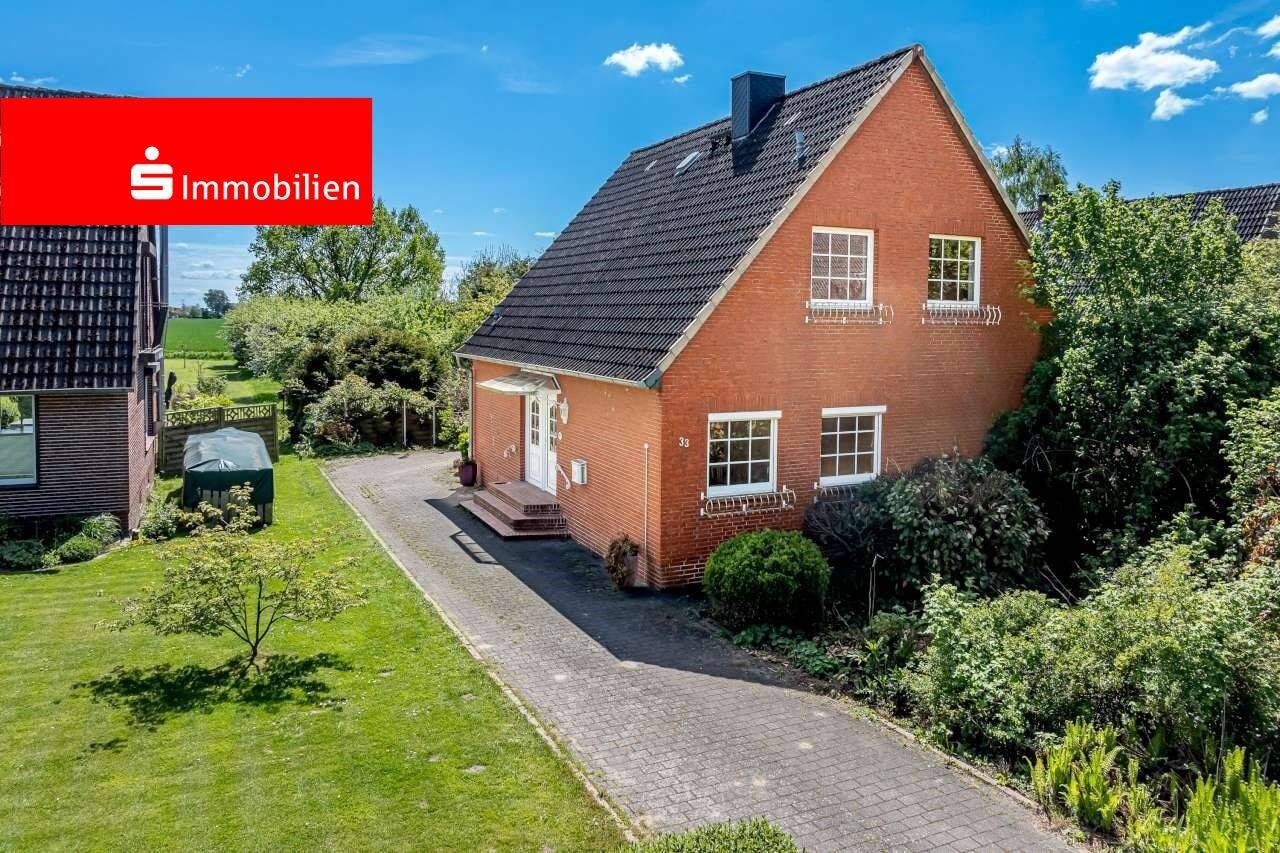Einfamilienhaus mit großem Grundstück in ruhiger und grüner Wohnlage von Seester!, 25370 Seester