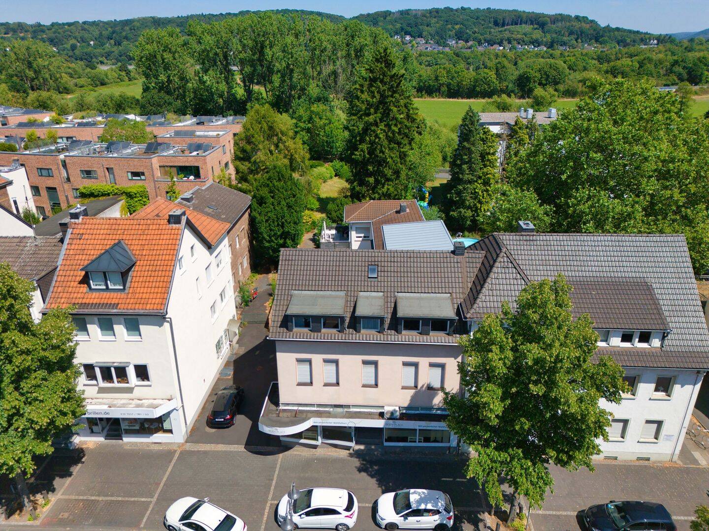MANNELLA *Vielseitiges Wohn- und Geschäftshaus in zentraler Bestlage* Mit Bauland mitten in Hennef, 53773 Hennef (Sieg)