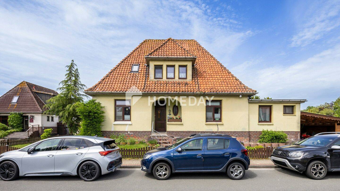 Viel Platz für die ganze Familie – Einfamilienhaus mit großem Garten auf über 1.000 m² Grundstück, 26936 Stadland
