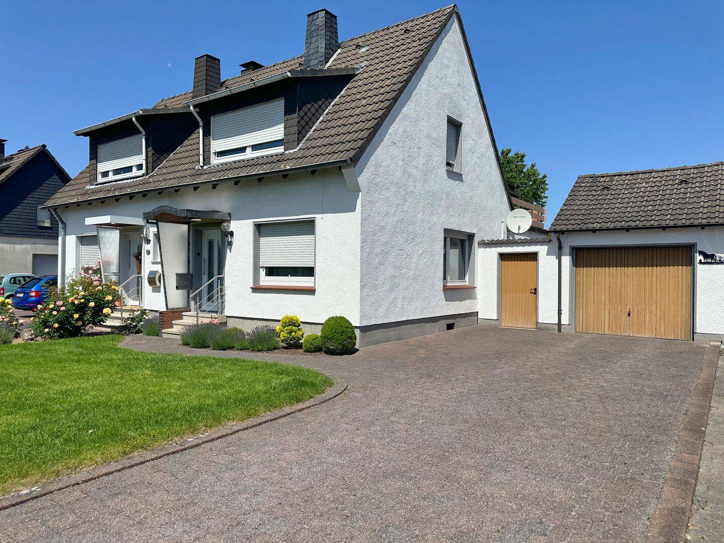 Solide Basis, viel Potenzial – Doppelhaushälfte mit Wintergarten, Garage und großem Garten, 59199 Bönen