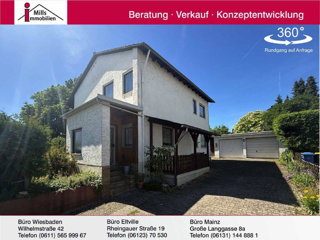 Freistehendes Einfamilienhaus mit schönem Garten in begehrter Feldrandlage von Oestrich-Winkel, 65375 Oestrich-Winkel