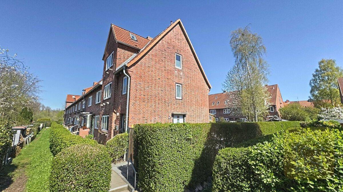 Flair pur! Moderne Eigentumswohnung mit eigenem Garten im Stil eines Endreihenhauses