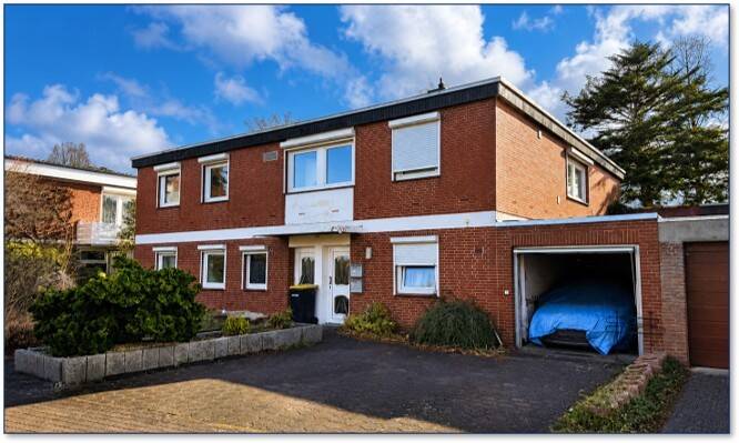 Freistehendes Einfamilienhaus mit Einliegerwohnung, Garage und Garten in ruhiger Wohnlage von Elmshorn, 25336 Elmshorn