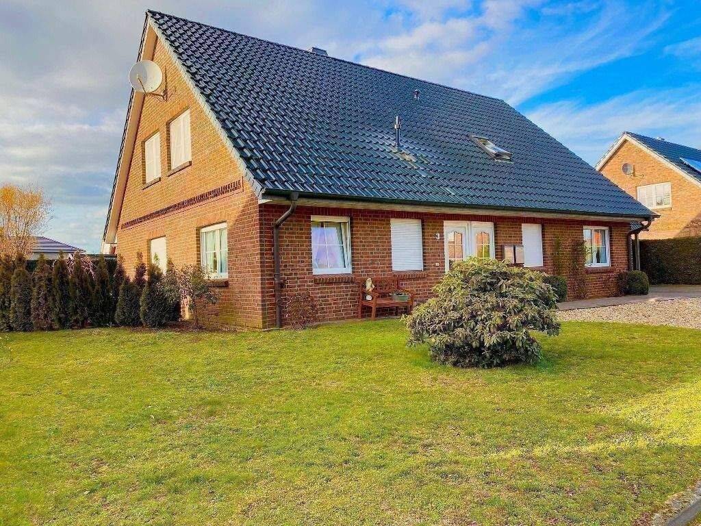 Traumhaftes Einfamilienhaus mit Einliegerwohnung in ruhiger Wohnlage von Nützen, 24568 Nützen