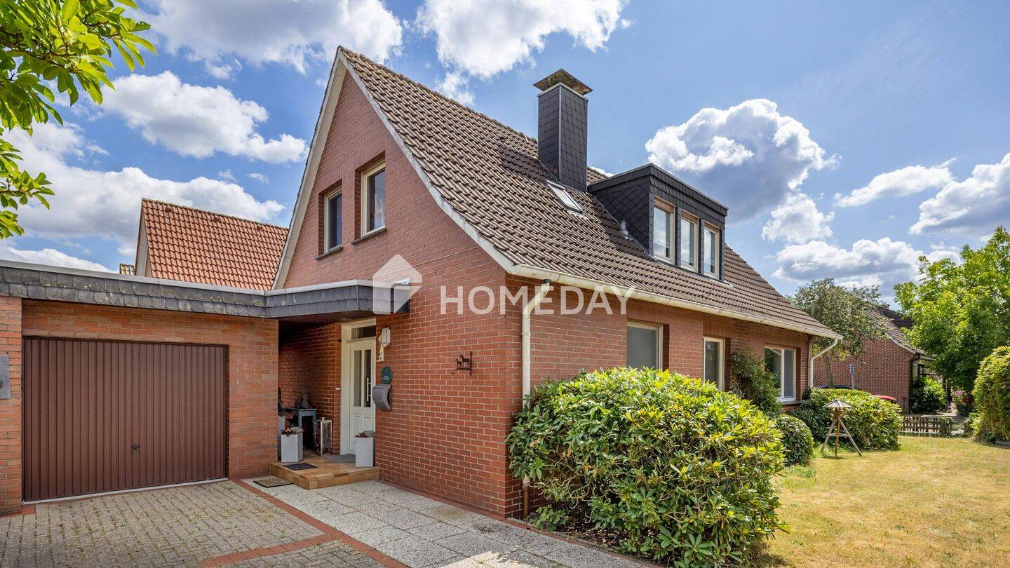 Charmantes Einfamilienhaus mit Garten, Doppelgarage und 4 Schlafzimmern in Schüttorf, 48465 Schüttorf