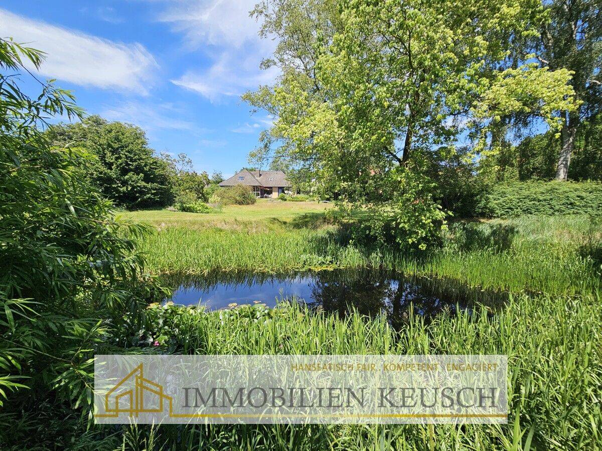 Traumgarten mit Teich, Bungalow mit Ausbaupotenzial & Sonnenterrasse in ruhiger Lage, Doppelgarage, 27367 Hassendorf