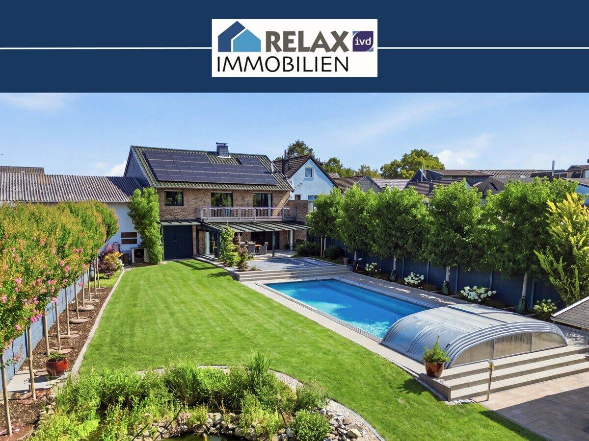 Modernisiertes Einfamilienhaus mit Pool und Traumgarten in Geilenkirchen-Teveren, 52511 Geilenkirchen