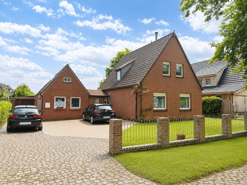 Gepflegtes Einfamilienhaus mit großem Garten und vielseitigen Nebengebäuden, 49846 Hoogstede