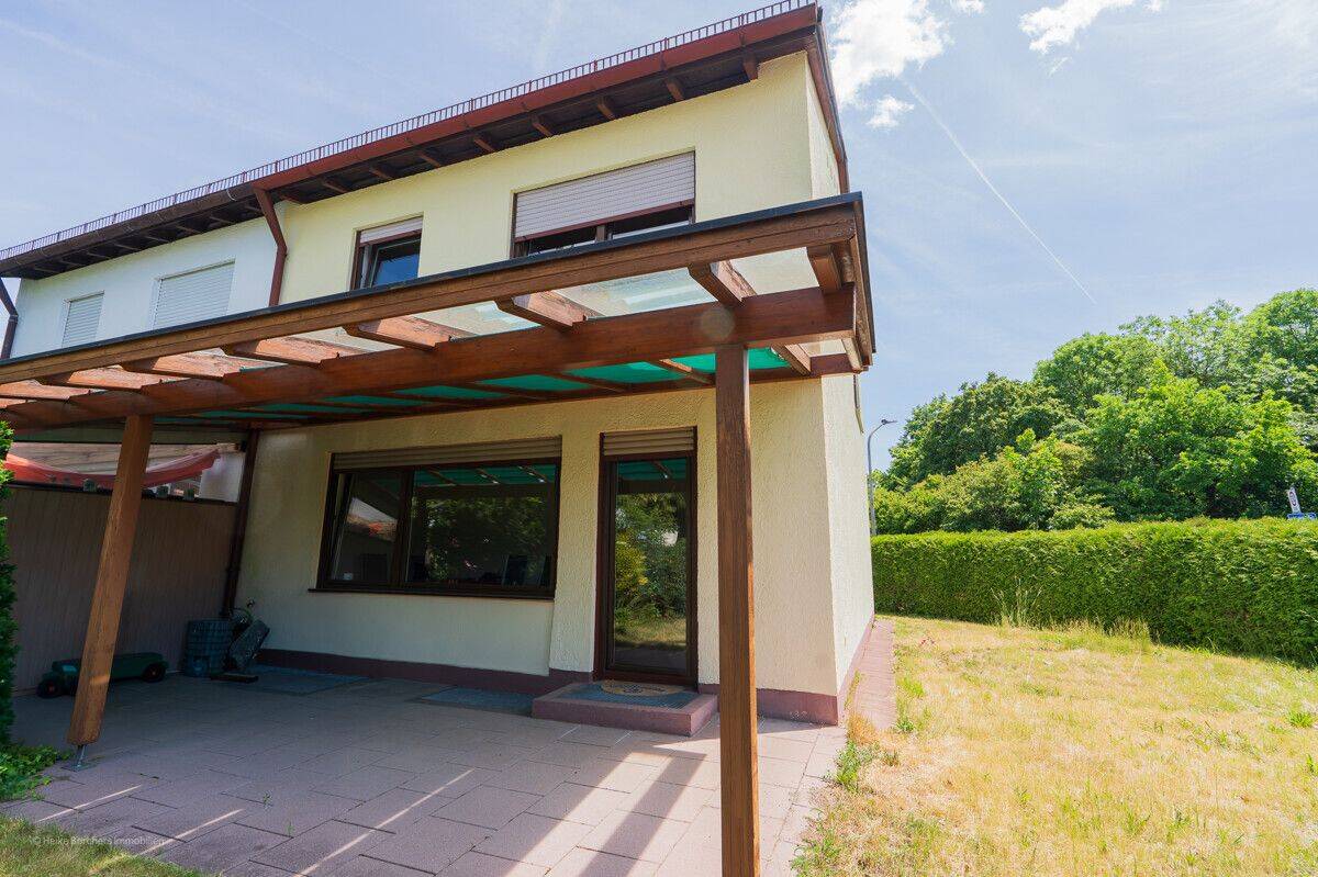 **Heike Borchers Immobilien**Ein Haus zum Gestalten – Reiheneckhaus mit sonnigem Süd-West-Garten**, 82008 Unterhaching