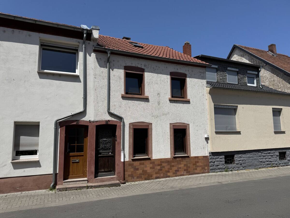 Einfamilienhaus mit Anbau und Garage, 67547 Worms (Innenstadt Weinsheim)
