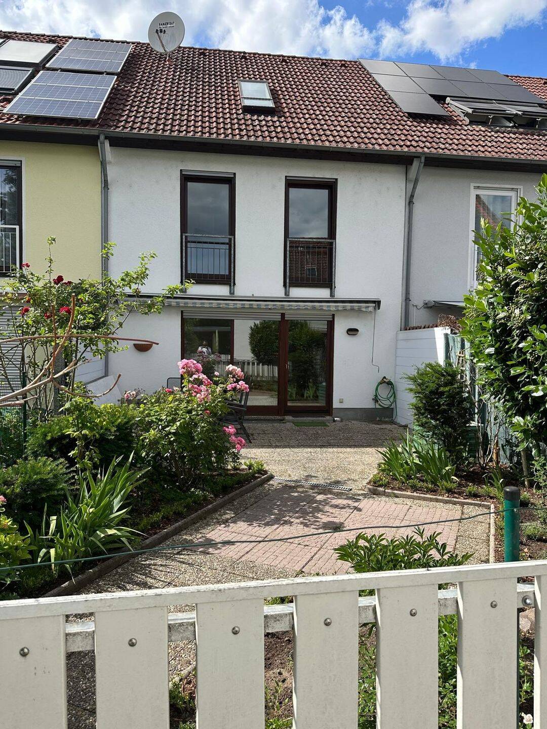 Großzügiges Reihenmittelhaus mit Terrasse, Stellplatz und Garage in attraktiver Lage von Viernheim, 68519 Viernheim