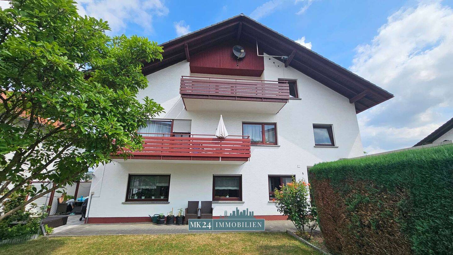 Ruhiges Wohnen auf viel Raum – Dachgeschosswohnung mit Balkon, Garten und PKW-Stellplatz, 35418 Buseck