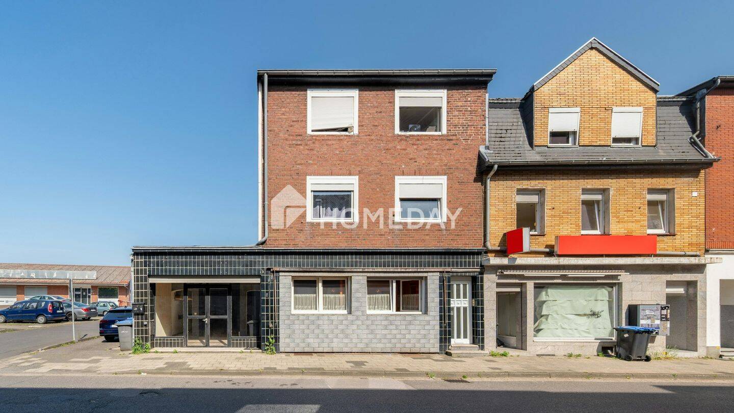Solides Mehrfamilienhaus mit freier Gewerbefläche, Terrasse, Balkon und Stellplätzen in Alsdorf, 52477 Alsdorf
