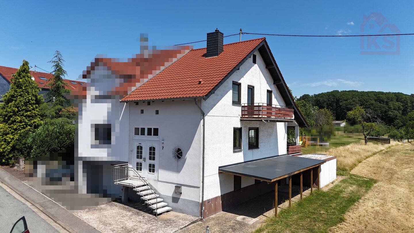 Gepflegte Doppelhaushälfte mit Garage, Terrasse und einem großem Garten in Heusweiler-Holz, 66265 Heusweiler