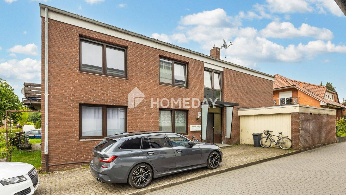 Charmantes Zweifamilienhaus in Lohne mit Garten, Garage und Vermietungspotenzial, 49393 Lohne (Oldenburg)