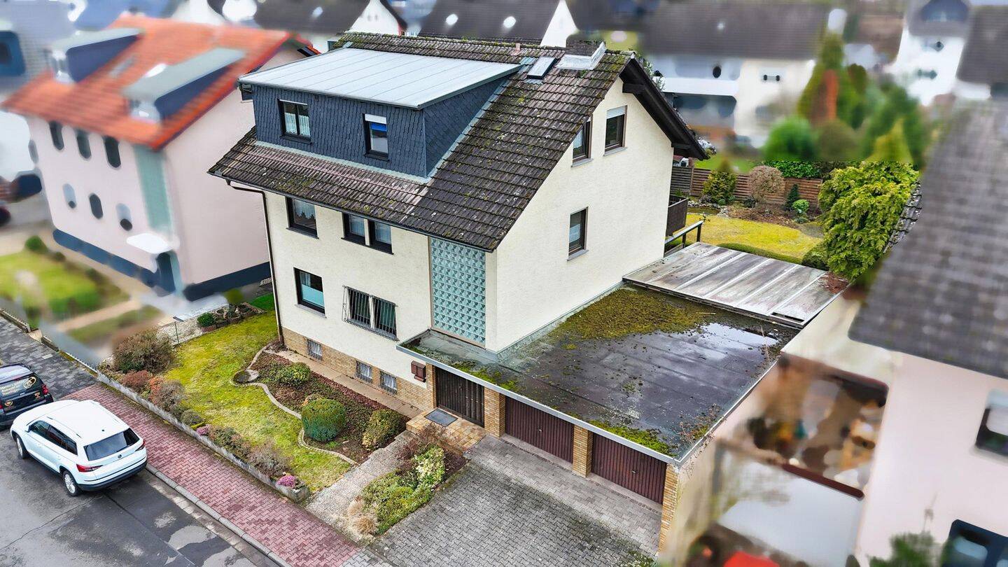 Provisionsfreies Mehrfamilienhaus mit Ausbaupotenzial in Toplage Bruchköbel, 63486 Bruchköbel