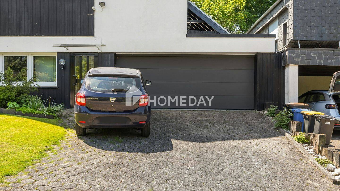 Familienfreundliches Einfamilienhaus mit Sauna, Doppelgarage und schönem Garten