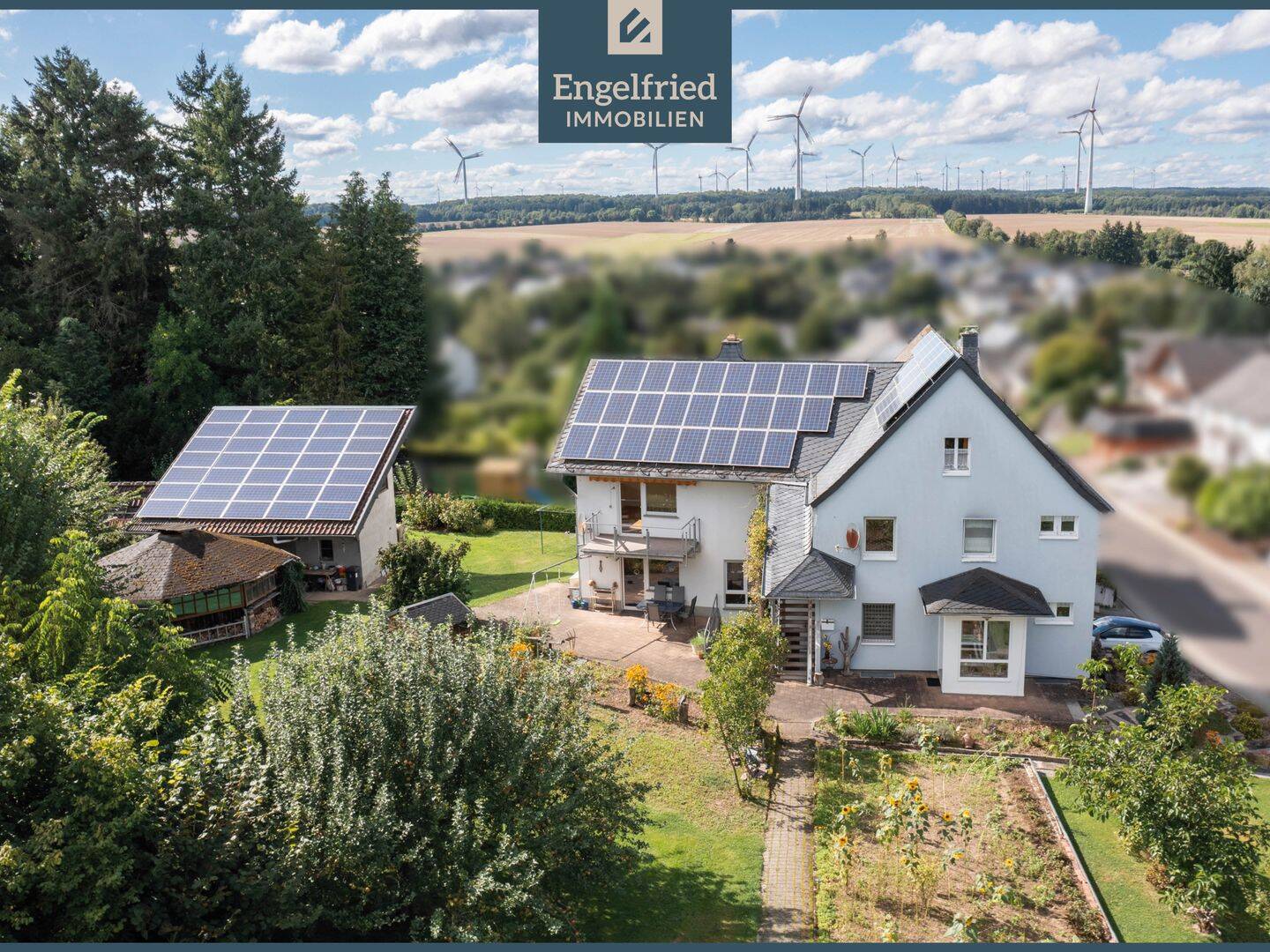Gepflegtes Ein- bis Zweifamilienhaus mit PV-Anlage auf großem Grundstück in Ortsrandlage, 55469 Nannhausen